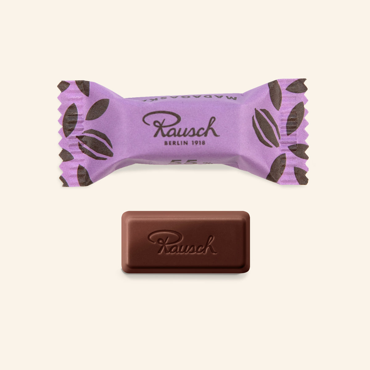 Handwerkliche Schokolade Madagaskar 55% mit violettem, braunem Papier und geprägtem Logo. - Rausch