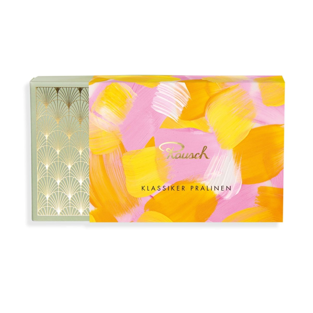 Rosa-orange Pralinenschachtel mit Pinselstrich-Muster als Banderole. Die Schachtel darunter ist eine dezent grüne Schachtel mit goldenen Verzierungen.