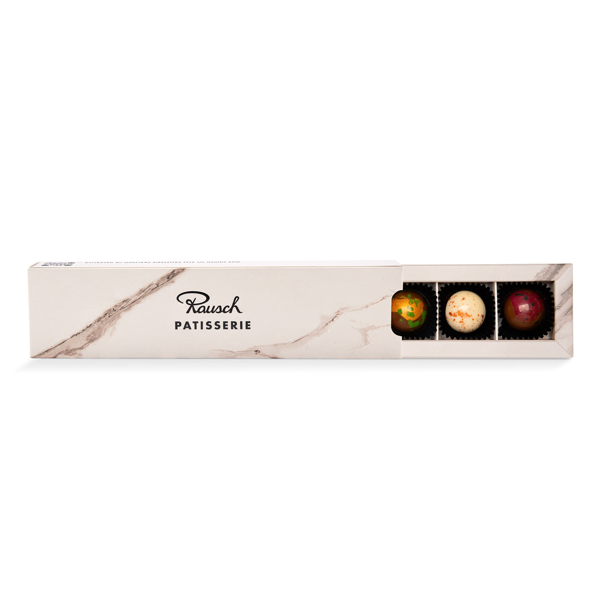 Elegante Pralinen-Box mit sechs handwerklich gefertigten Schokoladenpralinen in verschiedenen Farben. - Rausch