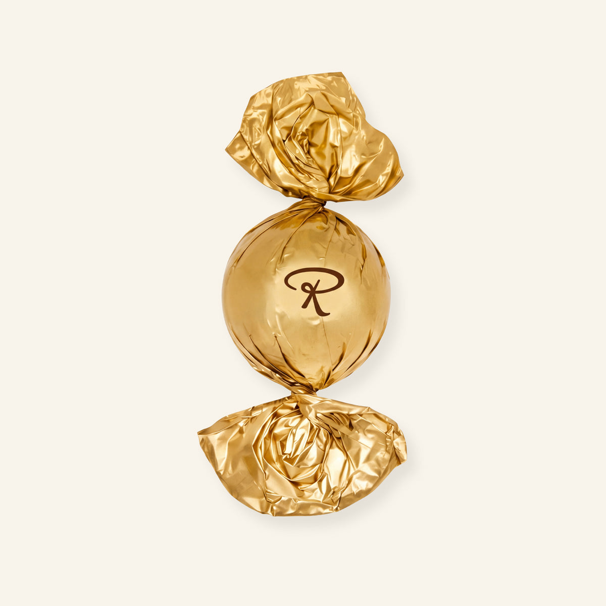 Goldene Pralinenkugelverpackung im Dubai-Stil von Rausch Schokoladen.