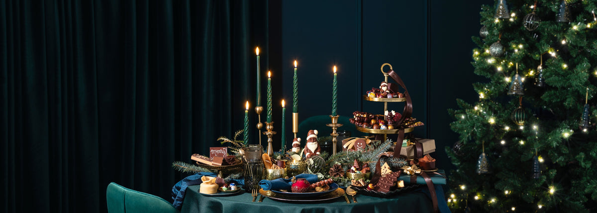 weihnachtlicher Tisch dekoriert mit Rausch Schokolade