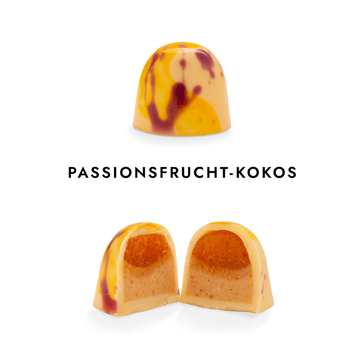 Handwerklich gefertigte Passionfrucht-Kokos-Praline mit gelber und violetter Schokoladenhülle, halbiert. - Rausch
