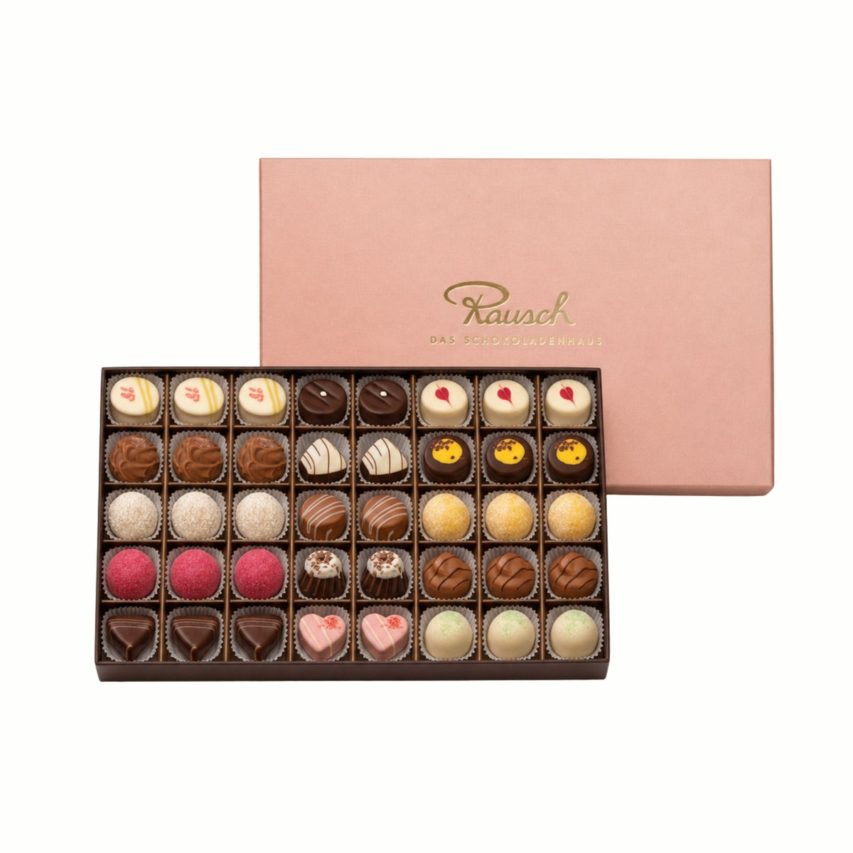 Rosa Schachtel mit 40 handwerklichen Pralinen in verschiedenen Formen und Farben. - Rausch